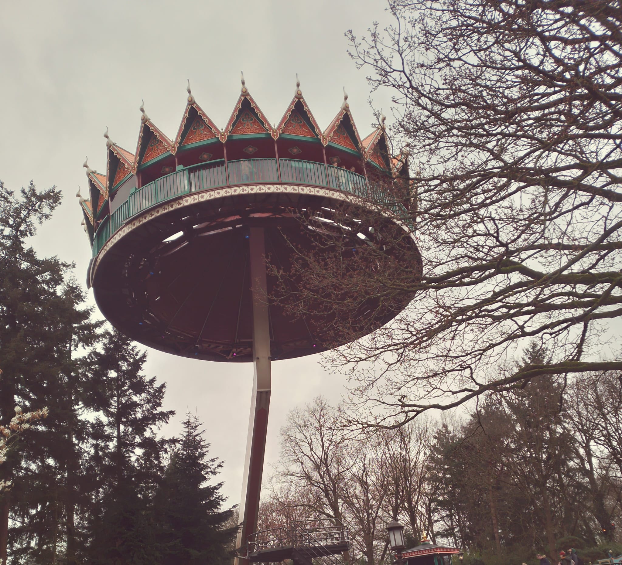 A Pagoda-like observation deck, spinning very slowly in the air.